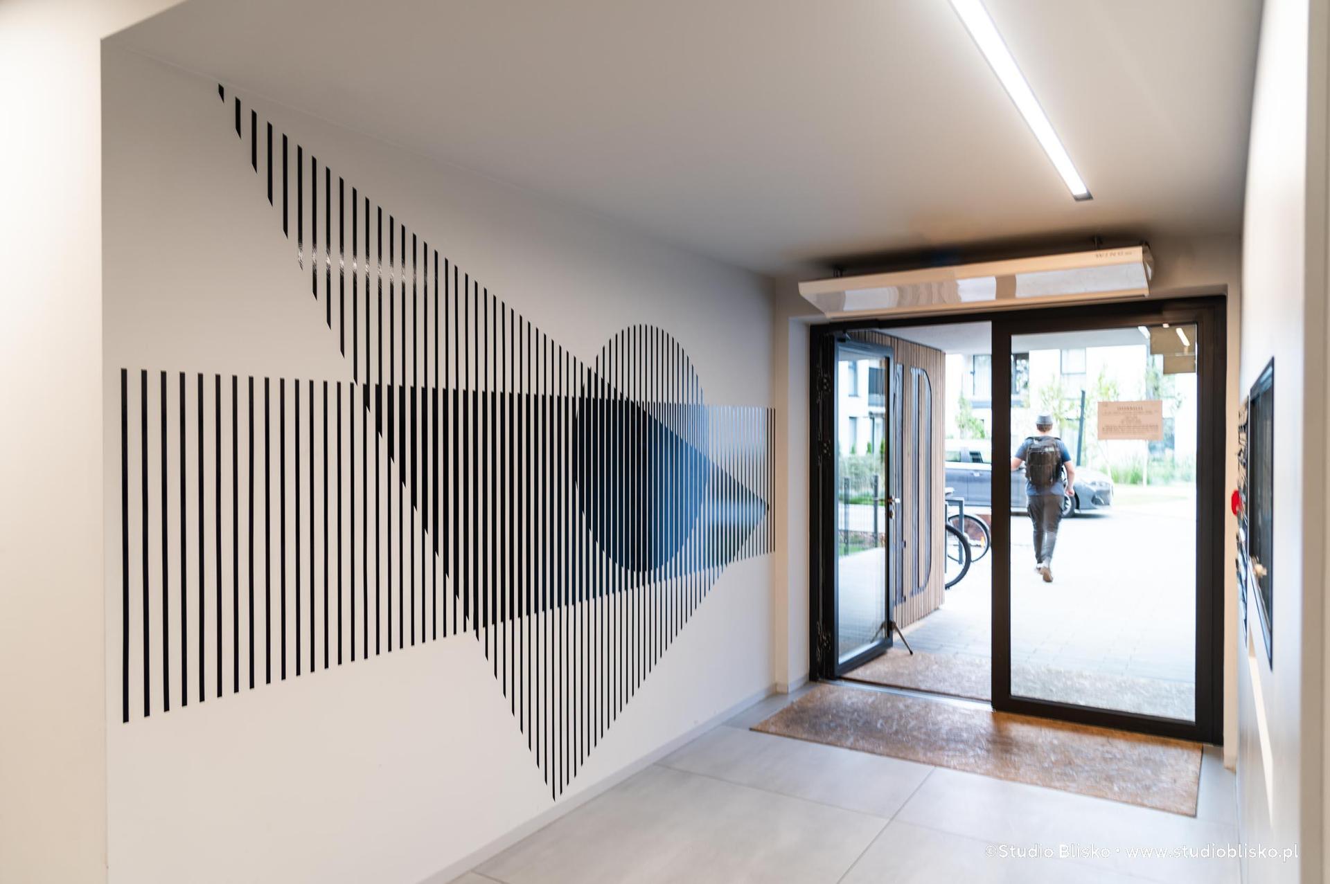 Wayfinding dla apartamentów Naturia w Toruniu 