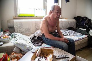 Mężczyzna z wielką szyją