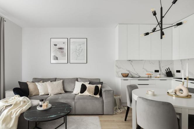 Szarość, biel i minimalizm – nowoczesne mieszkanie w Iławie