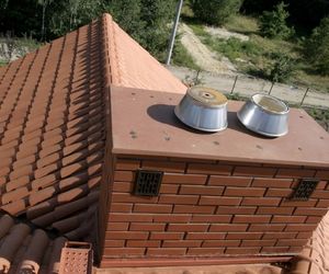 Komin ceramiczny: komin murowany z cegły