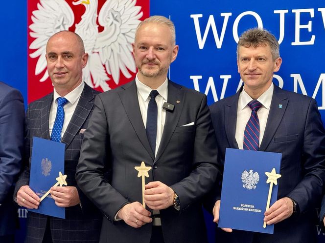 Wojewoda i różdżki.