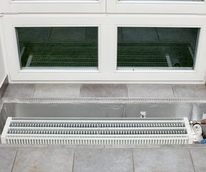 Grzejniki kanałowe - idealne rozwiązanie do jasnych przestronnych wnętrz z dużymi przeszkleniami