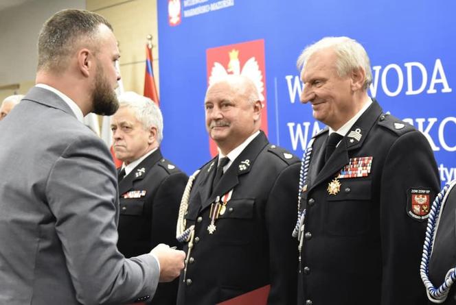 Wręczono odznaki Świętego Floriana i innne medale strażakom. Wśród zasłużonych wójt Gminy Iława