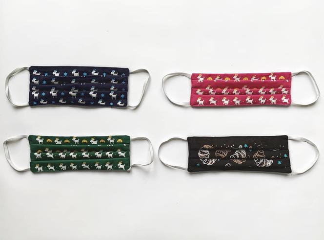 Pamiętajcie, zakrywajcie sznupy!. Zobacz wzory maseczek w symbole Poznania!