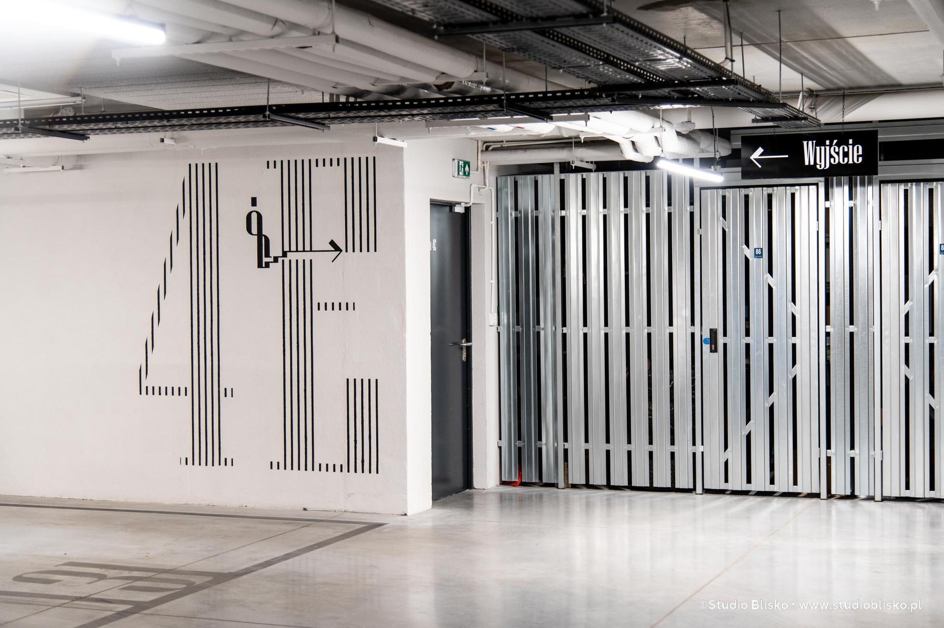 Wayfinding dla apartamentów Naturia w Toruniu 