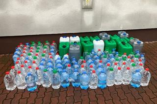 Zamiast wody, alkohol. 42-latek z Krakowa ukrywał prawie tysiąc litrów nielegalnej substancji