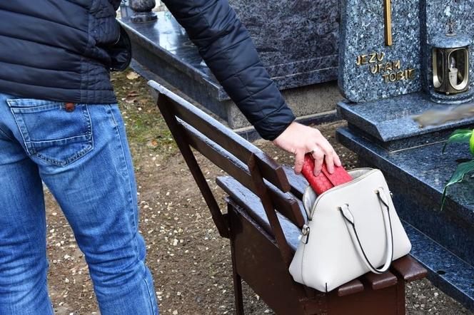 Kradzież portfela na cmentarzu