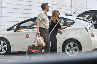 Agnieszka Kaczorowska i Marcin Rogacewicz z kijkiem wychodzą z treningu