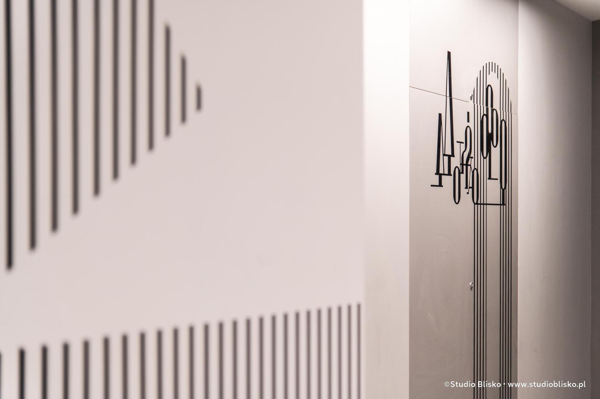 Wayfinding dla apartamentów Naturia w Toruniu 