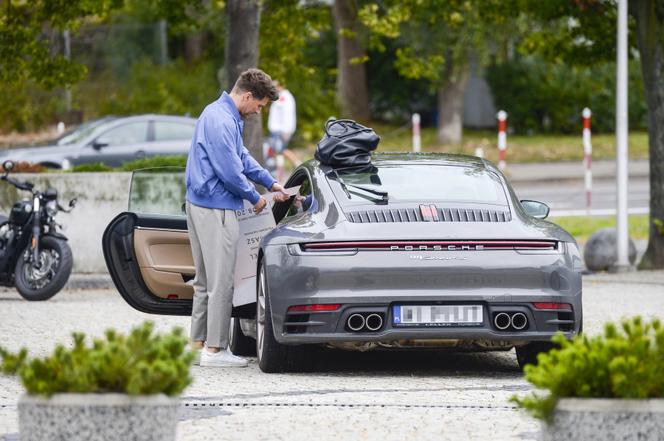 Tomasz Kammel jeździ Porsche 911 i limuzyną Audi A8 L