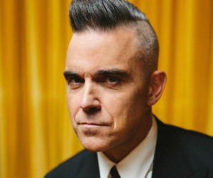 Robbie Williams posługuje się wymyślonym imieniem. To pomogło mu uporać się z problemami psychicznymi