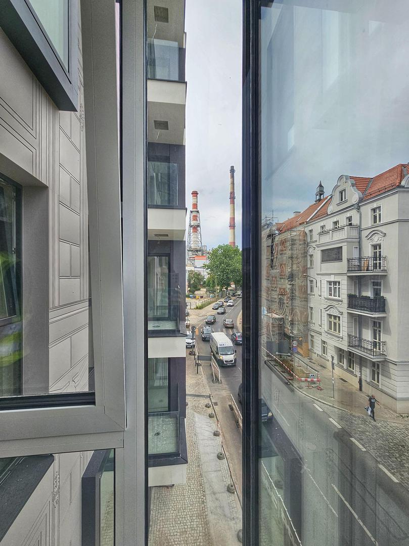 Nowa Kurkowa we Wrocławiu - zdjęcia elewacji i wnętrz budynku w trakcie prac wykończeniowych