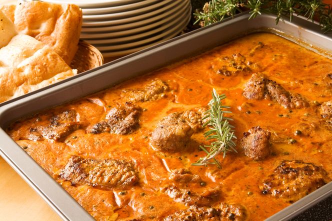 Karkówka zapiekana w sosie pomidorowym: przepis na schab karkowy 