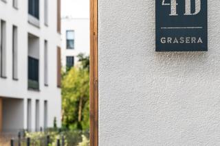 Wayfinding dla apartamentów Naturia w Toruniu 