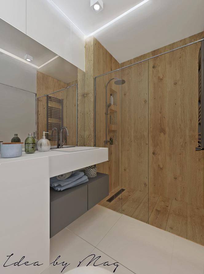 Aranżacja białej łazienki z drewnem