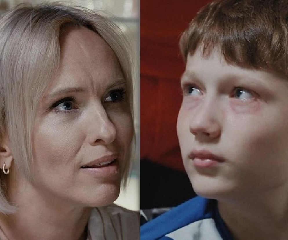 Iwona Rejzner jako Dorota i Jarosław Śmigielski jako Franek w M jak miłość. Dorota, z krótkimi blond włosami i złotymi kolczykami, patrzy w bok z zamyśloną miną. Franek, z brązowymi włosami i smutnym wyrazem twarzy, ma lekko zaczerwienione oczy. Więcej o ich losach na Super Seriale.