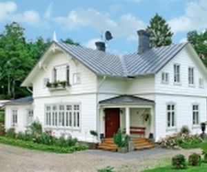 Płytki betonowe, cementowe, siding: czy warto nimi zastąpić naturalne materiały na elewacji?