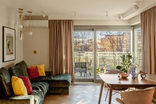 Mieszkanie w odcieniach zieleni z kroplą złota