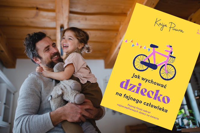 śmiejąca się dziewczynka z tatą