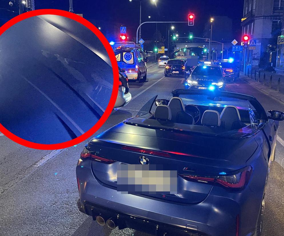 Warszawa. Kierowca sportowego BMW potrącił policjanta. Funkcjonariusz odbił się od maski pojazdu