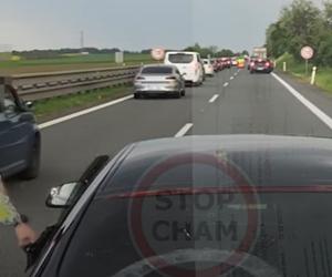 Agresor w BMW zajechał drogę innemu kierowcy. Wysiadł z samochodu i uderzył go w twarz [NAGRANIE]