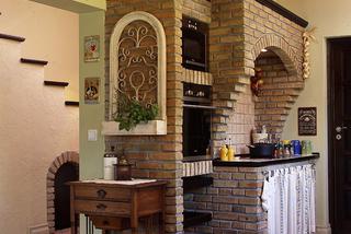 aranżacja kuchnia - ściana z cegły