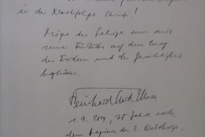 Wpis kard. Marxa do księgi pamiątkowej Sanktuarium ks. Jerzego