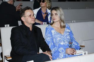 Syn Bartłomieja Topy z ojcem na ściance