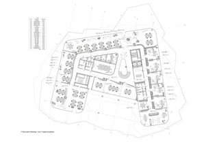 Brownfield - biurowiec na post-industrialnym terenie kopalni otoczonym przez sztuczne jeziora