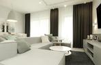 Apartament w duchu ocieplonego minimalizmu