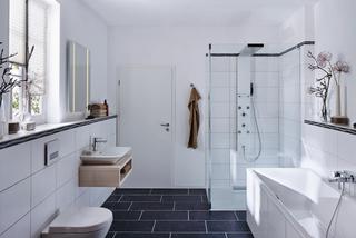 Szara łazienka z gresem: nowoczesna aranżacja łazienki w szarościach i bieli
