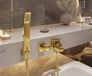 Łazienka ze złotymi akcesoriami i dodatkami – geometryczna doskonałość