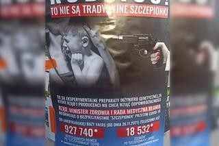 Szokujący plakat w Siemianowicach Śląskich. Pistolet przy skroni dziecka i hasła antyszczepionkowców! 