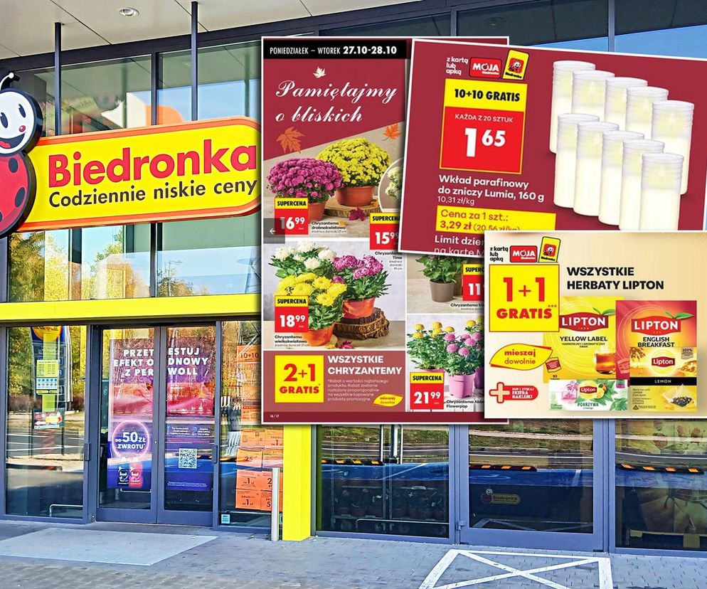 Fasada sklepu Biedronka z widocznym logotypem i hasłem Codziennie niskie ceny. Na szybach plakaty informujące o promocjach 10+10 gratis na wkłady parafinowe Lumia, chryzantemy 2+1 gratis oraz 1+1 gratis na herbaty Lipton. Więcej o ofertach przeczytasz na Super Biznes.