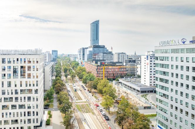 Apartamentowiec Powstańców 7D we Wrocławiu z czteropoziomowym parkingiem podziemnym