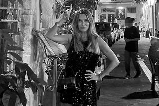 Hanna Lis z dzieckiem na kolanach