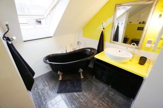 Aranżacja łazienki z kolorem żółtym