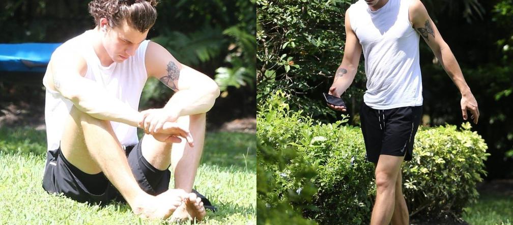 Shawn Mendes zamyślony w parku