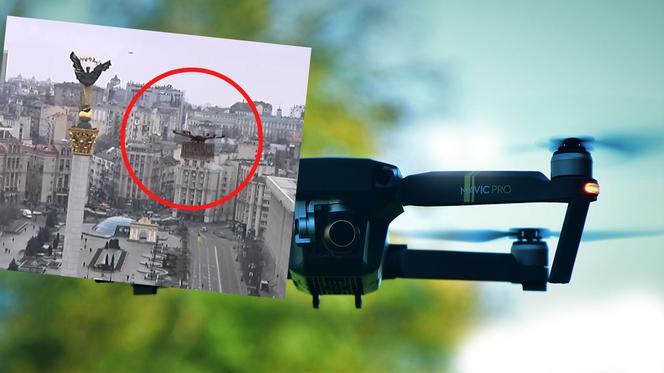 Kijów - dron z ogłoszeniem w obiektywie kamery