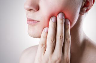 Ropień zęba: przyczyny, objawy, leczenie