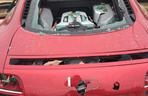 Zniszczone Audi R8 przez zranioną kobietę