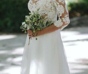 Porównaliśmy suknie ślubne córek prezydentów