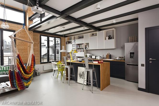 Kuchnia w salonie w klimacie loft