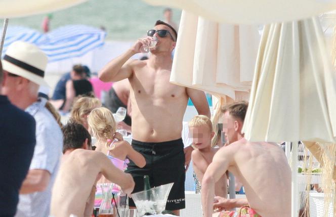 Sławomir Peszko na plaży