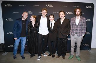 Syn Bartłomieja Topy z ojcem na ściance