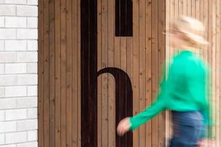 Wayfinding dla apartamentów Naturia w Toruniu 