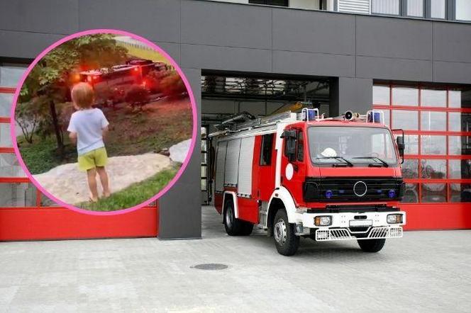 Wóz strażacki i chłopiec