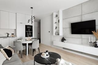 Szarość, biel i minimalizm – nowoczesne mieszkanie w Iławie