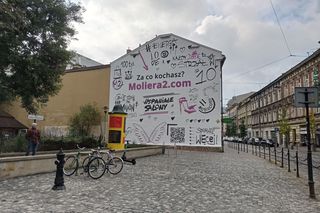 Reklamy na polskich zabytkach. Grożą wysokie kary za brak odpowiednich pozwoleń. Jak można ich uniknąć?