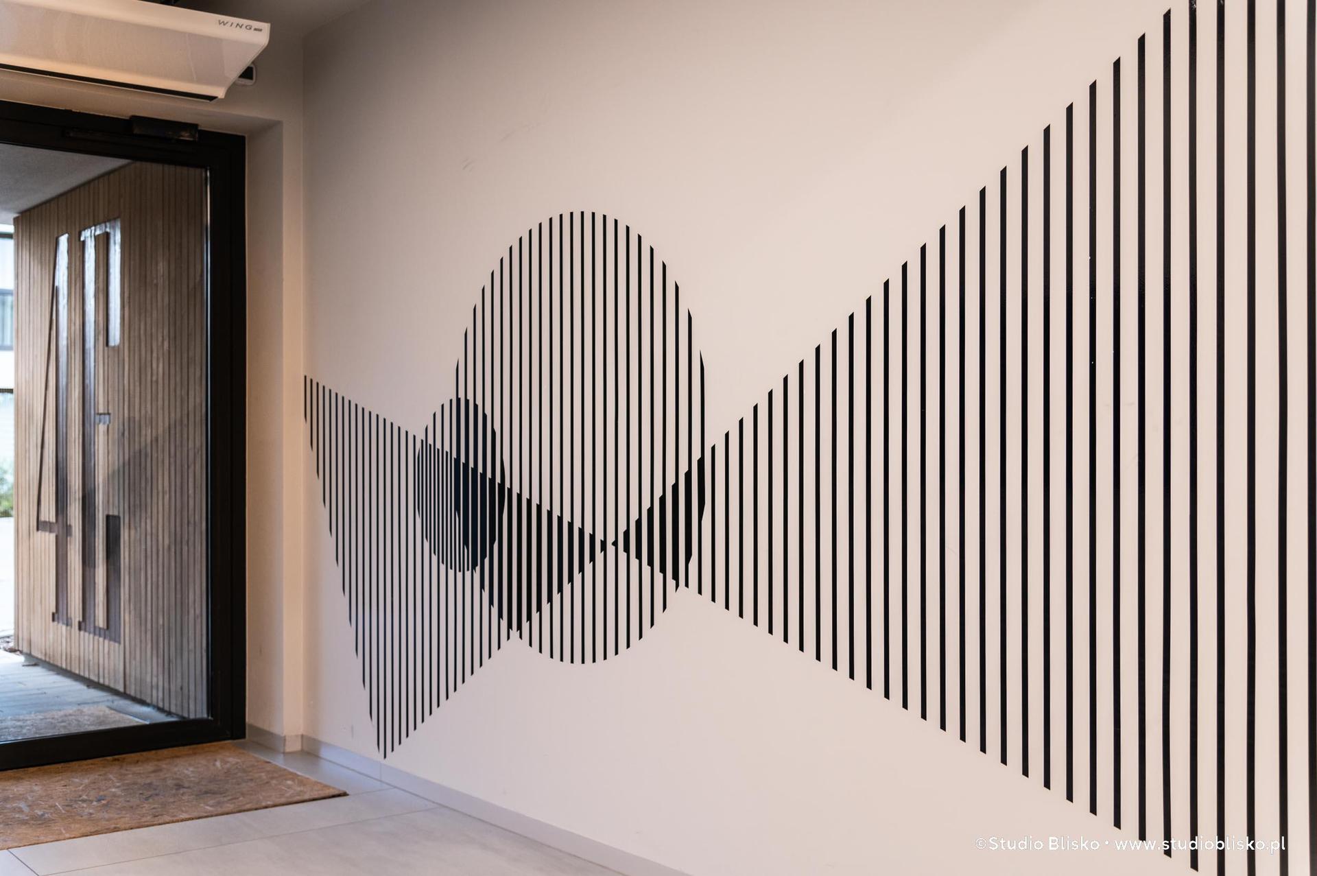 Wayfinding dla apartamentów Naturia w Toruniu 